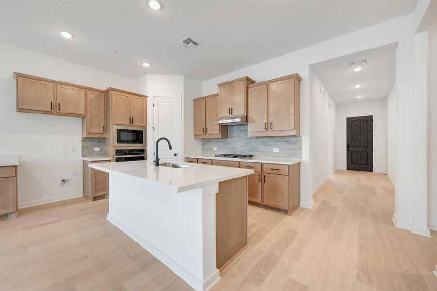 Furnished interior view inside a new home in Heritage, Dripping Springs (Image 15).