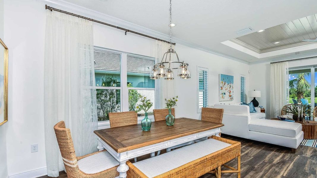 Furnished interior view inside a new home in SkySail Real Estate and Homes for Sale in Naples, FL - Neal Communities, Naples (Image 8).