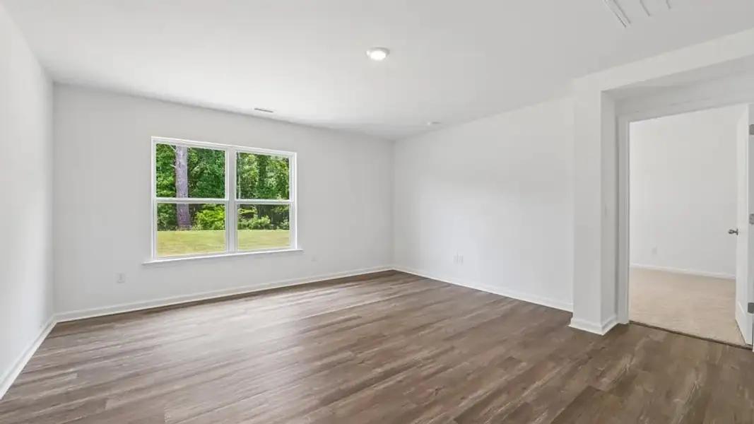 Spacious, unfurnished interior of a new home in Mangum Farms, Stem (Image 18).