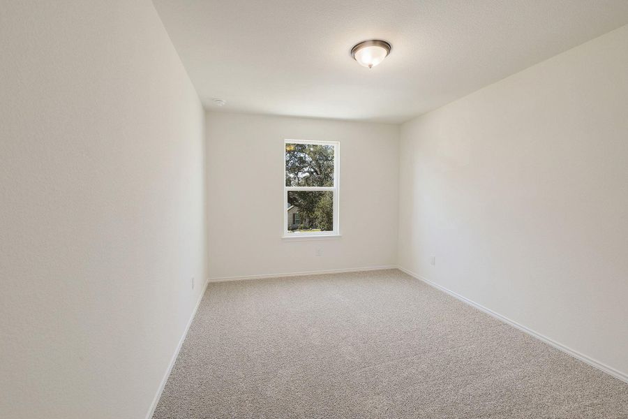 Spacious, unfurnished interior of a new home in River Bluff, Leander (Image 15).