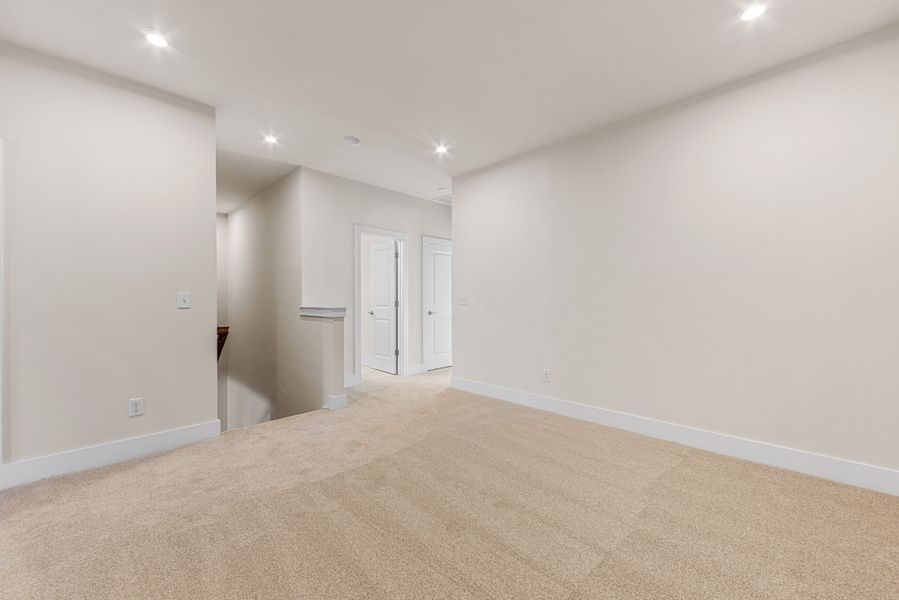 Spacious, unfurnished interior of a new home in Seven Oaks, Belmont (Image 29).
