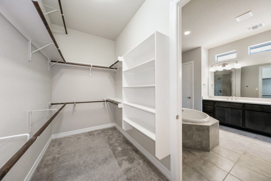 Representative furnished interior of a home built from the The Scottsdale IV by Whitestone Custom Homes in Johnson Ranch, Bulverde (Image 15).