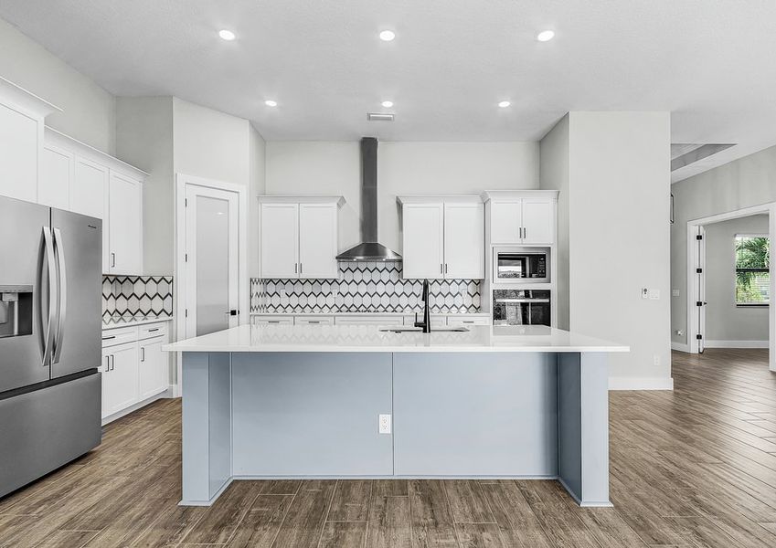 Stainless steel appliances are included.