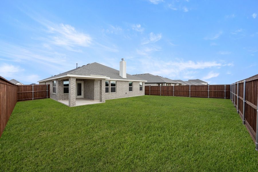 Front exterior of a new home in Myrtle Creek, Waxahachie, TX, highlighting curb appeal (Image 26). Front exterior of a new home in Myrtle Creek, Waxahachie, TX, highlighting curb appeal (Image 26).