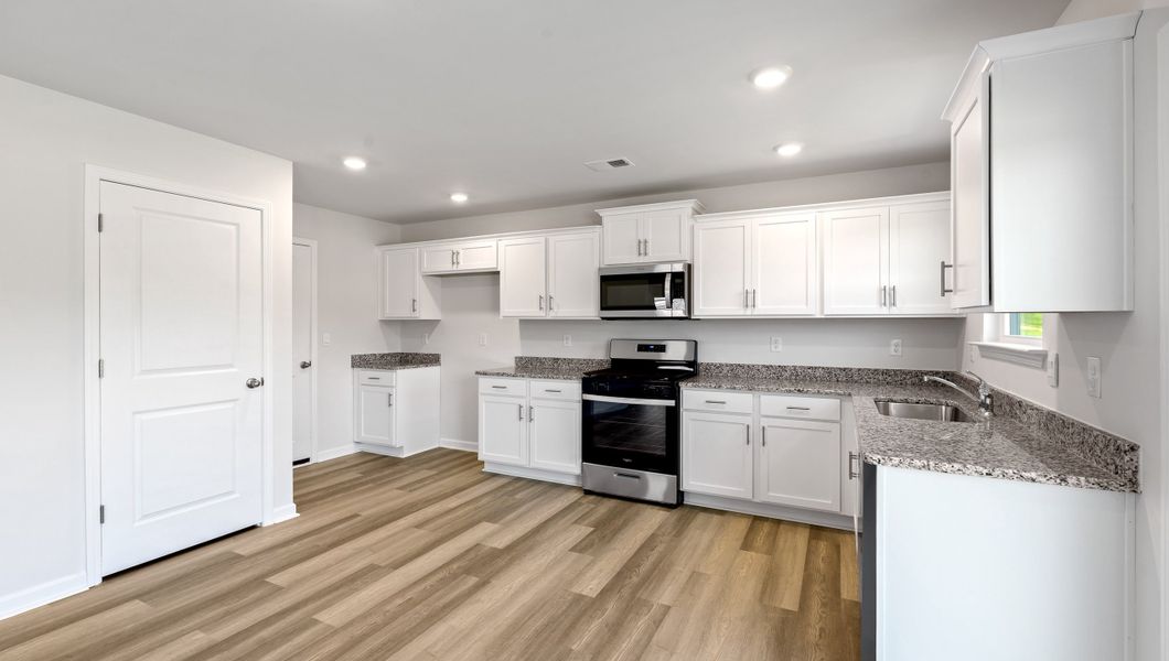 Representative furnished interior of a home built from the TAYLOR by D.R. Horton in Stone Creek, Clinton (Image 7).