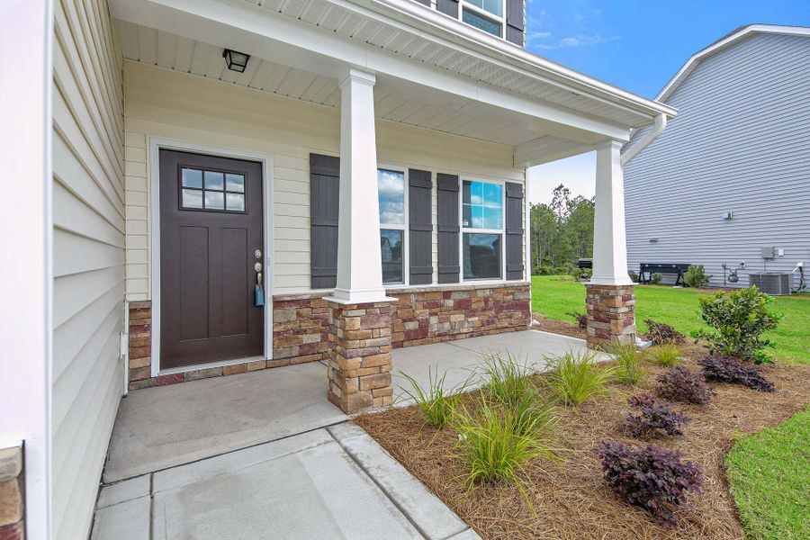 Representative exterior photo of a completed home built from the Meadowbrook by Caviness & Cates Communities in Sutherland Station at Olde Liberty, Franklinton, NC (Image 109). Representative exterior photo of a completed home built from the Meadowbrook by Caviness & Cates Communities in Sutherland Station at Olde Liberty, Franklinton, NC (Image 109).