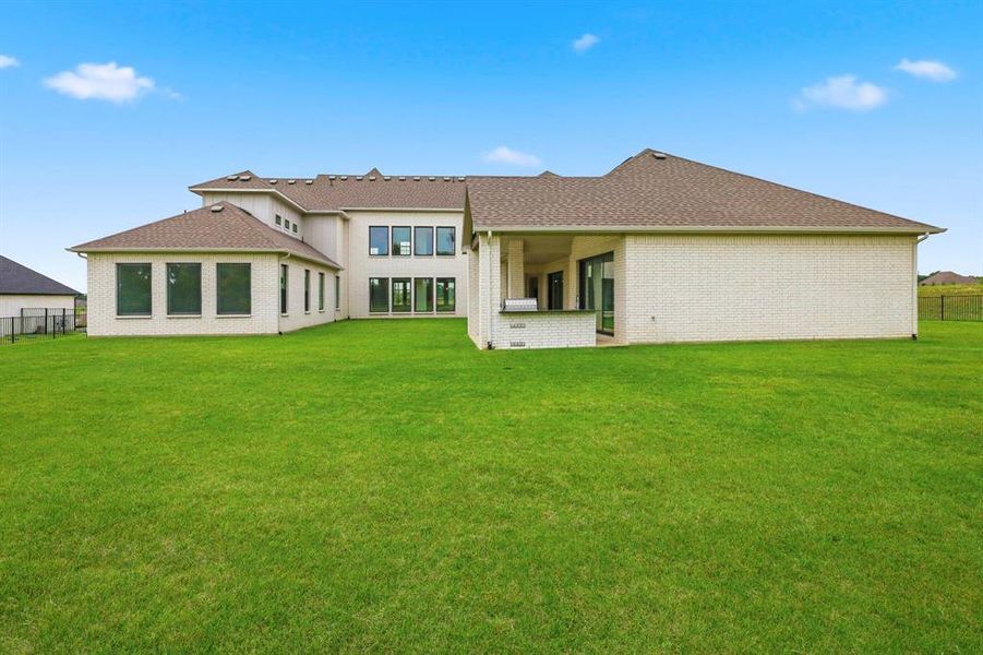 Exterior details and patio area of a home in Dean Farms, Lucas (Image 17).