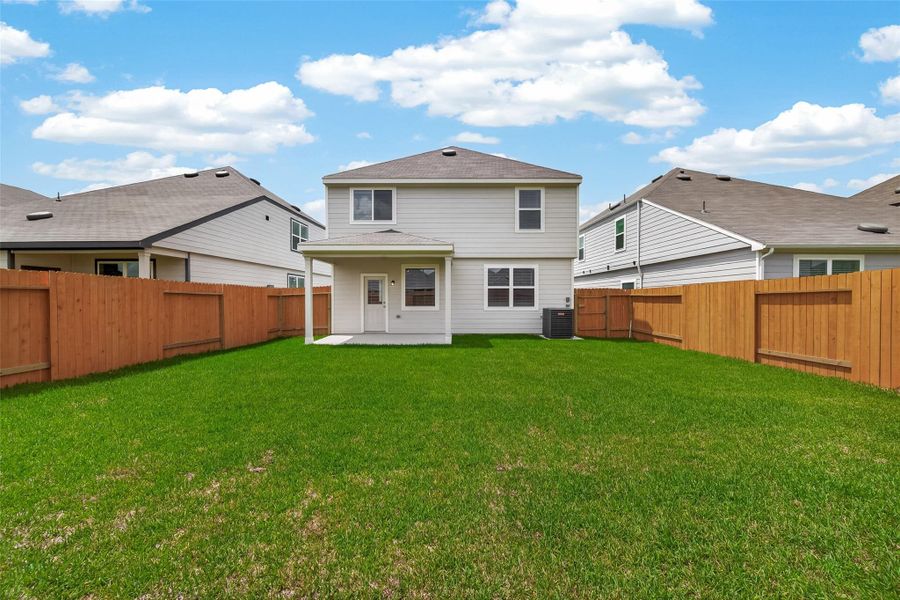 Exterior details and patio area of a home in Wayside Village, Houston (Image 31).