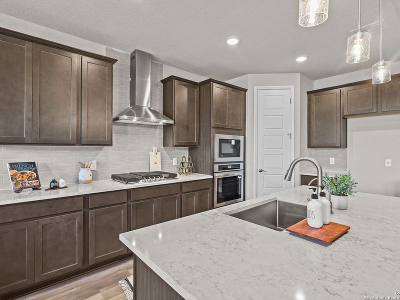 Furnished interior view inside a new home in The Reserve at Potranco Oaks, Castroville (Image 13).