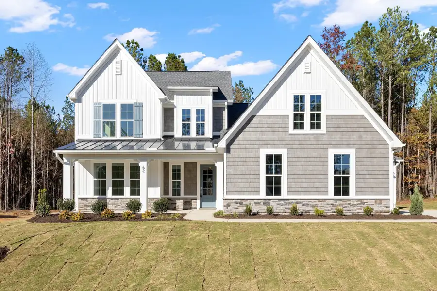 Representative exterior photo of a completed home built from the The Chandler by RobuckHomes in Baylee Ridge, Selma, NC (Image 40). Representative exterior photo of a completed home built from the The Chandler by RobuckHomes in Baylee Ridge, Selma, NC (Image 40).