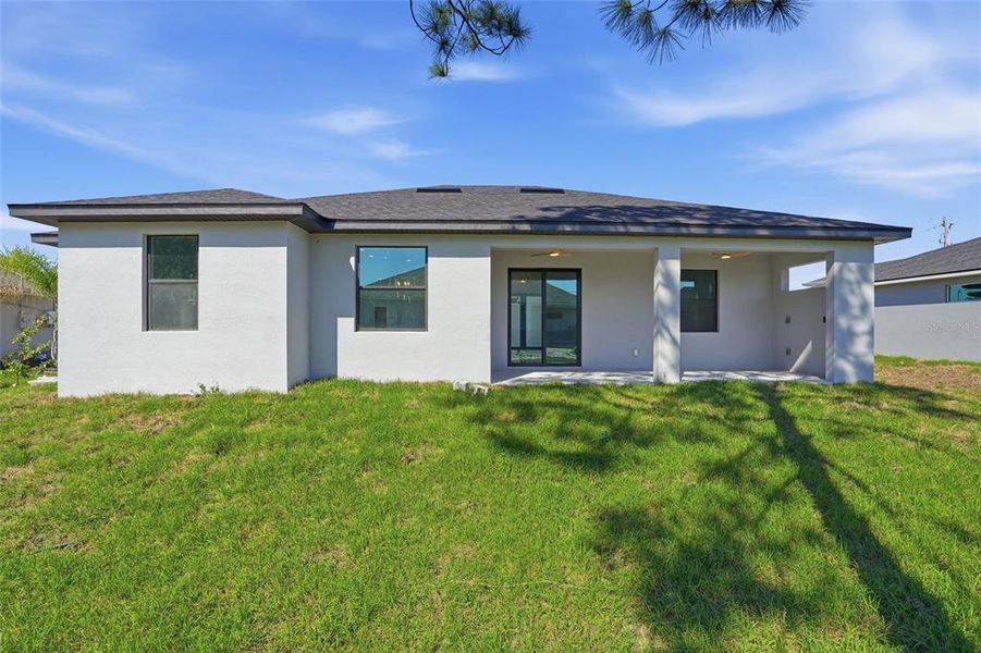 Exterior details and patio area of a home in , Lehigh Acres (Image 4). Exterior details and patio area of a home in , Lehigh Acres (Image 4).