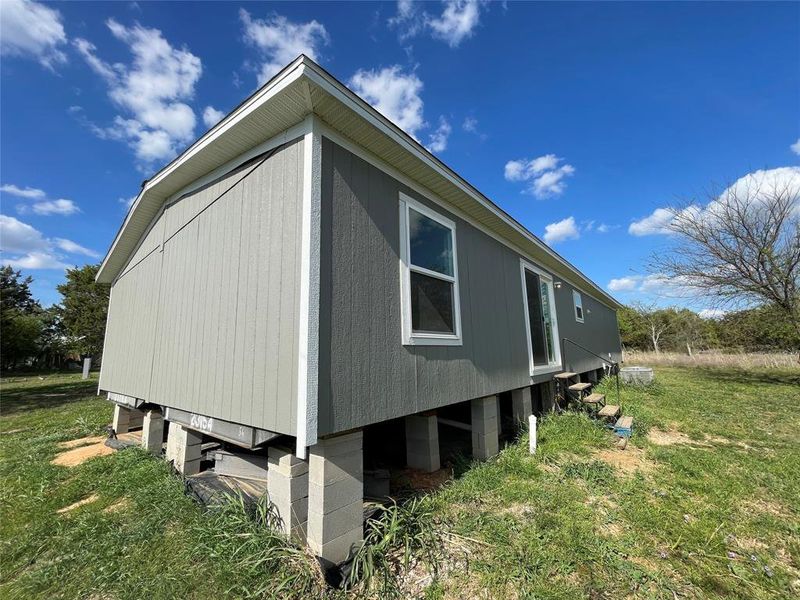 Exterior details and patio area of a home in , Stephenville (Image 14).