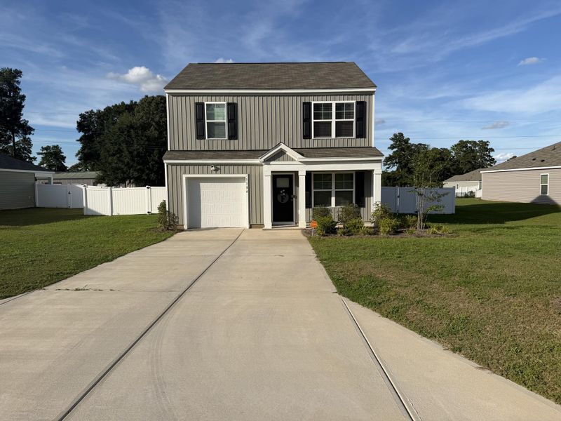 Front exterior of a new home in , Manning, SC, highlighting curb appeal (Image 2). Front exterior of a new home in , Manning, SC, highlighting curb appeal (Image 2).