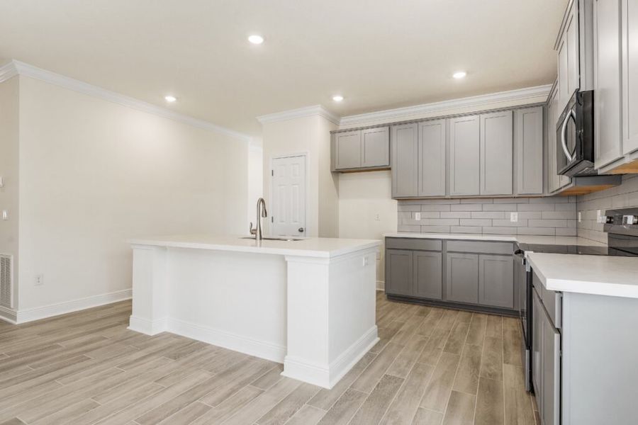 Furnished interior view inside a new home in Natureview, Freeport (Image 10).