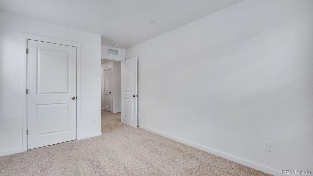 Spacious, unfurnished interior of a new home in Settlers Crossing, Commerce City (Image 29).