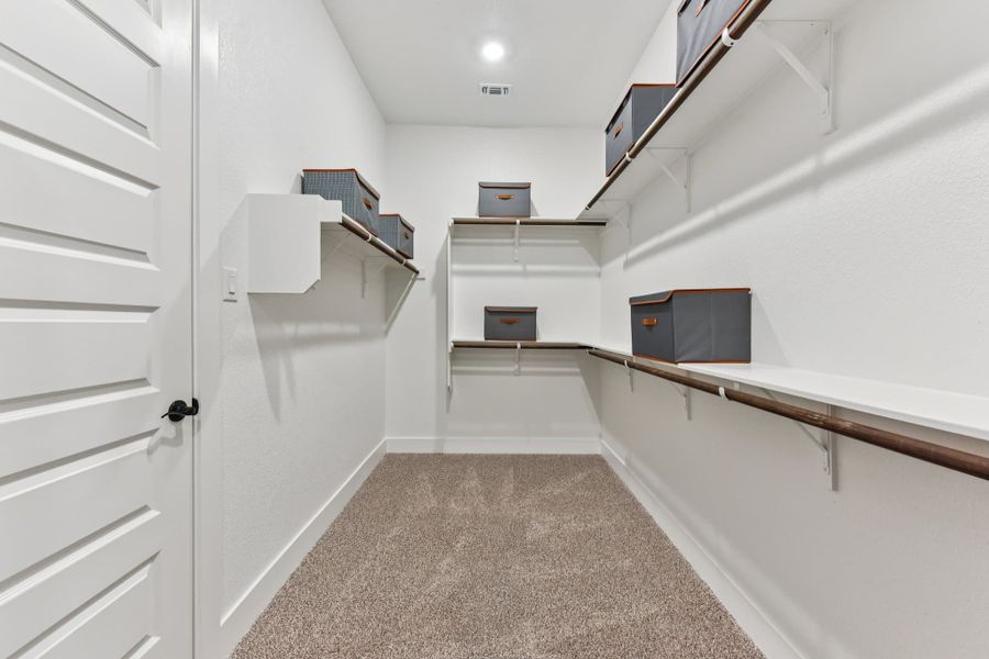 Furnished interior view inside a new home in The Grove at Blackhawk, Pflugerville (Image 83). Furnished interior view inside a new home in The Grove at Blackhawk, Pflugerville (Image 83).