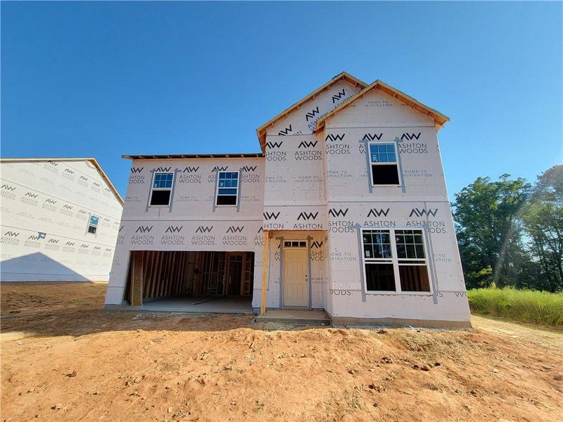 Front exterior of a new home in The Estates at Casteel, Bethlehem, GA, highlighting curb appeal (Image 12).
