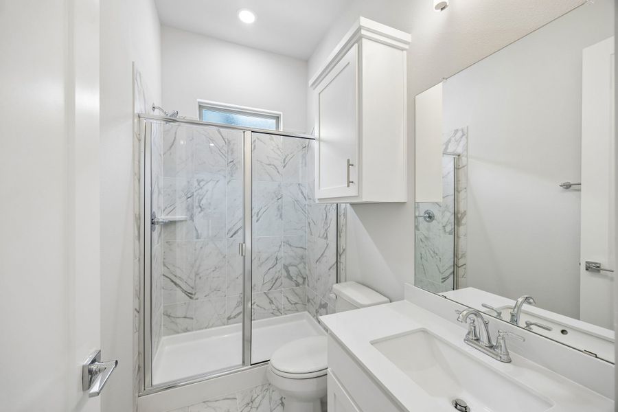 Bathroom in the Picasso II home plan by Trophy Signature Homes – REPRESENTATIVE PHOTO Bathroom in the Picasso II home plan by Trophy Signature Homes – REPRESENTATIVE PHOTO