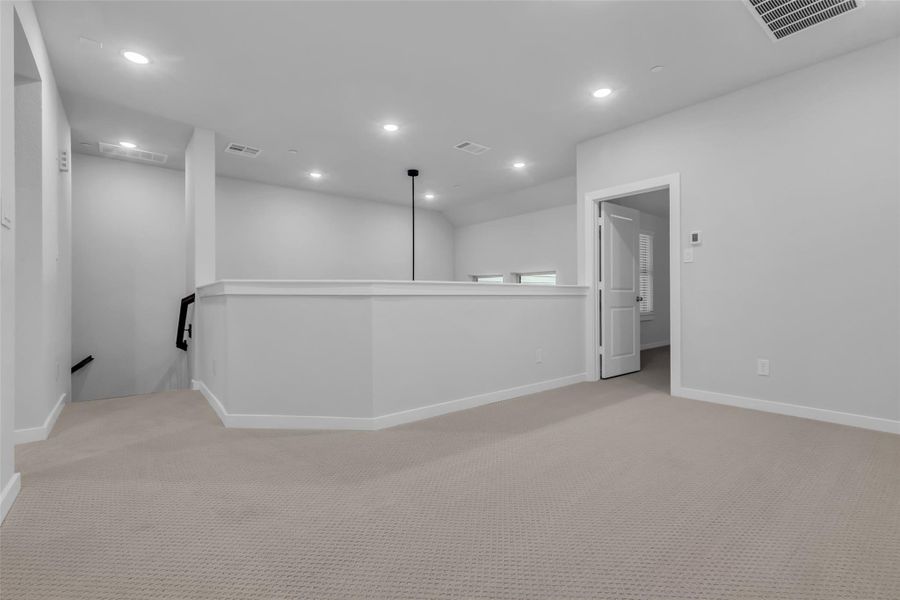 Loft area could be used as an office, game room, playroom or flex space.