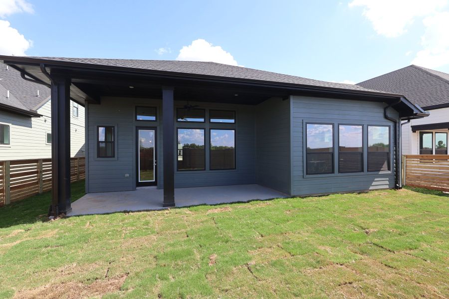 Exterior details and patio area of a home in Bridgeland Central: Emerald Heights - Enclave Collection, Cypress (Image 20).