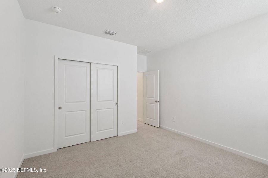 Spacious, unfurnished interior of a new home in Flagler Village - Signature Series, Palm Coast (Image 28).