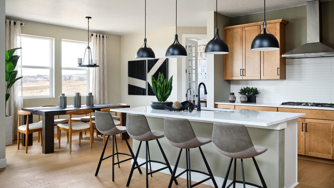 Representative furnished interior of a home built from the Roxborough by Taylor Morrison in Trailstone, Arvada (Image 9).