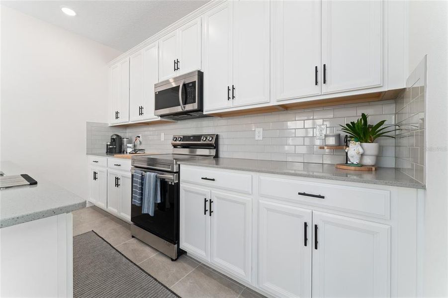 Furnished interior view inside a new home in Mezzano, Winter Garden (Image 15).