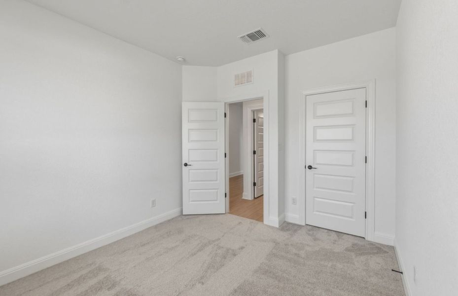 Representative unfurnished interior of a home built from the Saddlebrook by Pulte Homes in Santa Rita Ranch, Liberty Hill (Image 21).
