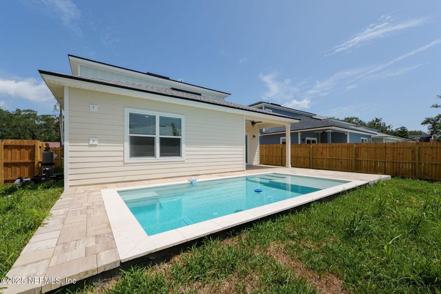 Front exterior of a new home in , St. Augustine, FL, highlighting curb appeal (Image 1).