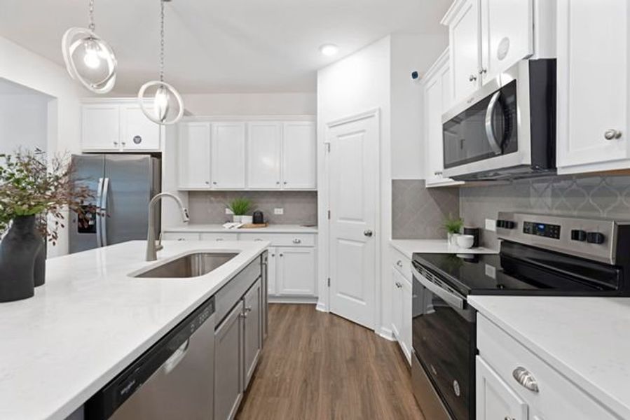 Representative furnished interior of a home built from the Alexandria TH by True Homes in Covington Ridge Townhomes, Thomasville (Image 6).