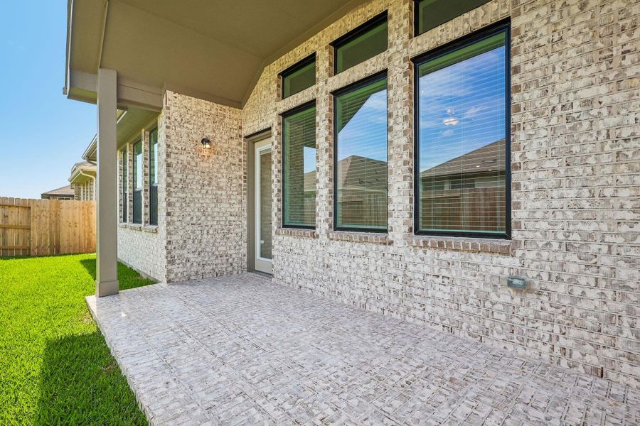 Exterior details and patio area of a home in Wood Leaf Reserve, Tomball (Image 2). Exterior details and patio area of a home in Wood Leaf Reserve, Tomball (Image 2).