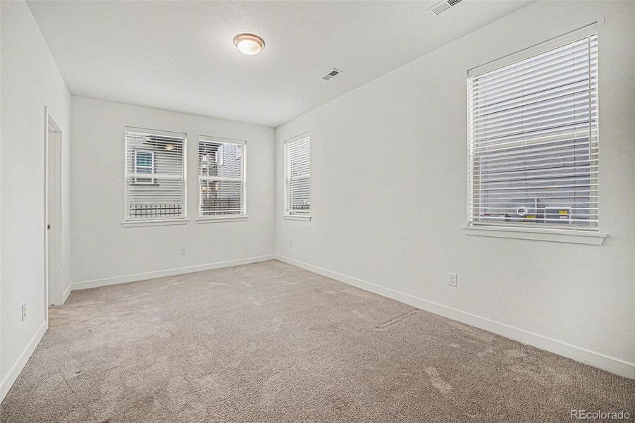 Spacious, unfurnished interior of a new home in Red Rocks Ranch, Morrison (Image 26).