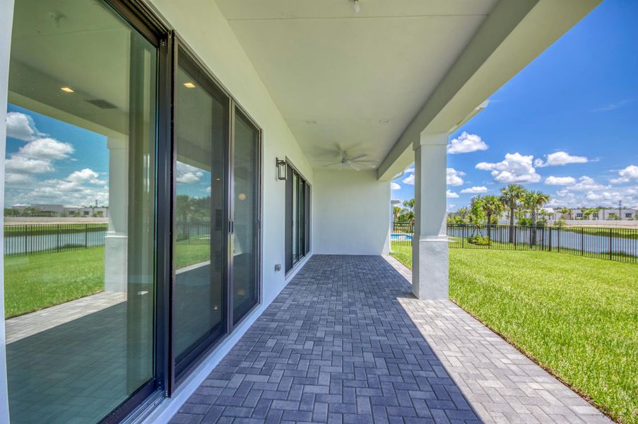 Exterior details and patio area of a home in Apex at Avenir, Palm Beach Gardens (Image 4).