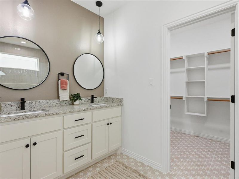 Dual sink vanity and large master closet give plenty of space to get ready for the day.