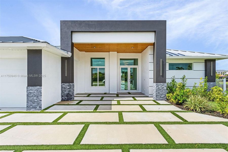 Front exterior of a new home in , Cape Coral, FL, highlighting curb appeal (Image 16).