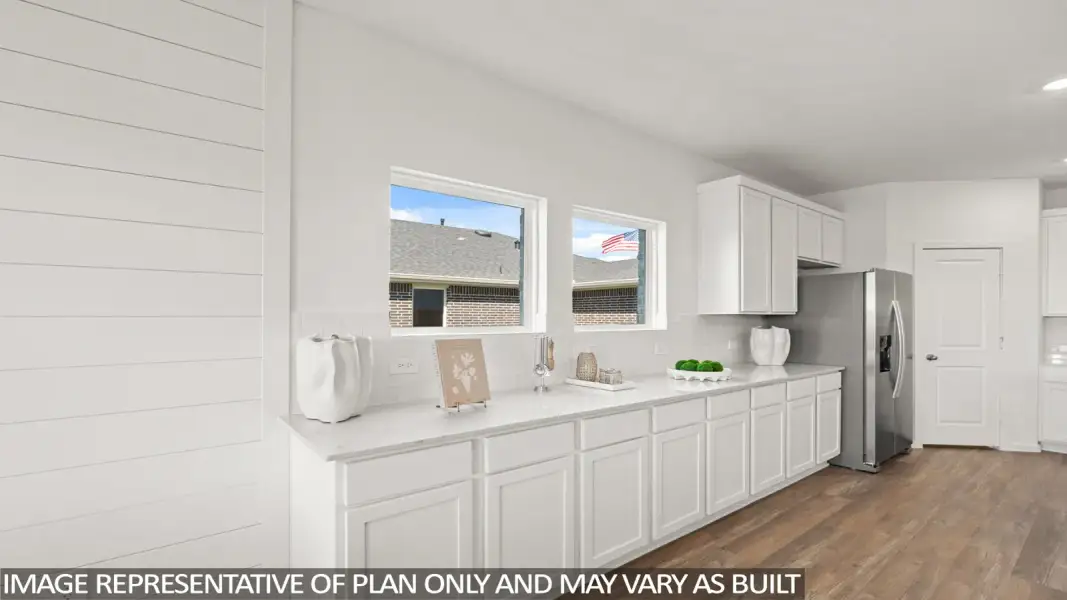 Furnished interior view inside a new home in Sunterra Lakes, Brookshire (Image 15).