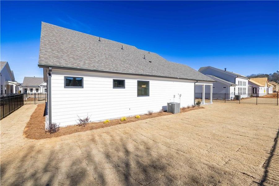 Exterior details and patio area of a home in Promenade at Sawnee Village, Cumming (Image 21). Exterior details and patio area of a home in Promenade at Sawnee Village, Cumming (Image 21).