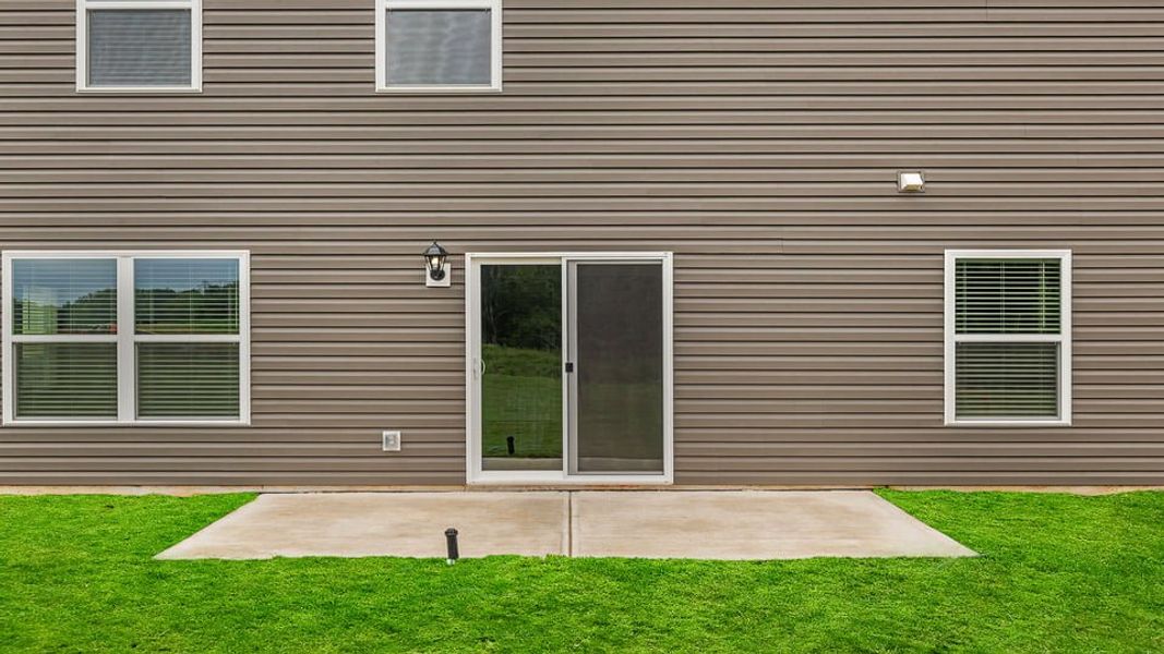 Exterior details and patio area of a home in Lakestone, Woodruff (Image 3).