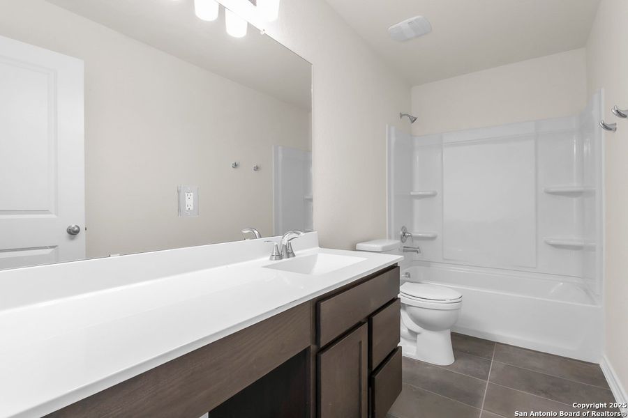 Furnished interior view inside a new home in Medina Crossing, Von Ormy (Image 6).