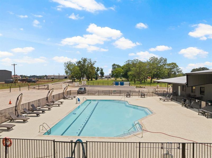 Community pool with a patio area