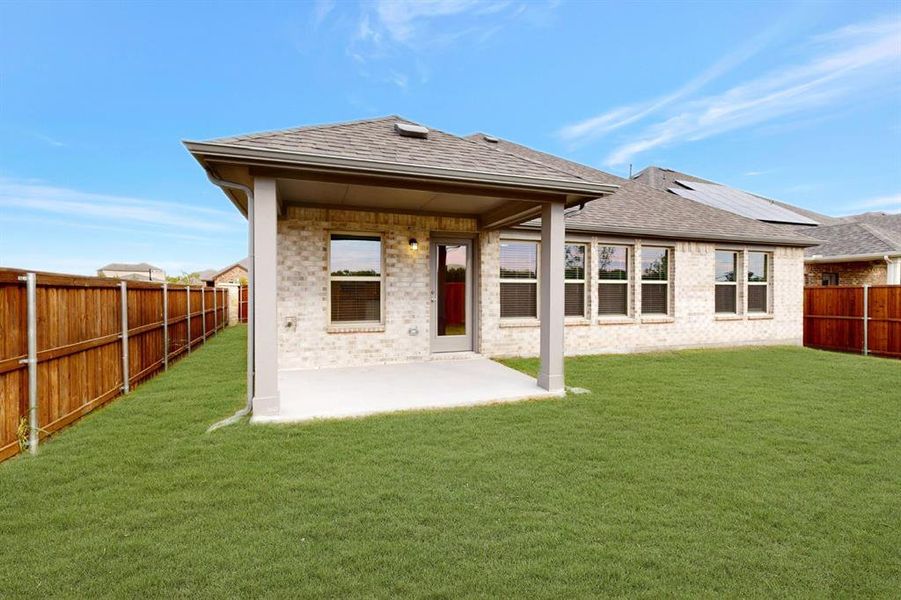 Exterior details and patio area of a home in The Preserve, Justin (Image 4). Exterior details and patio area of a home in The Preserve, Justin (Image 4).