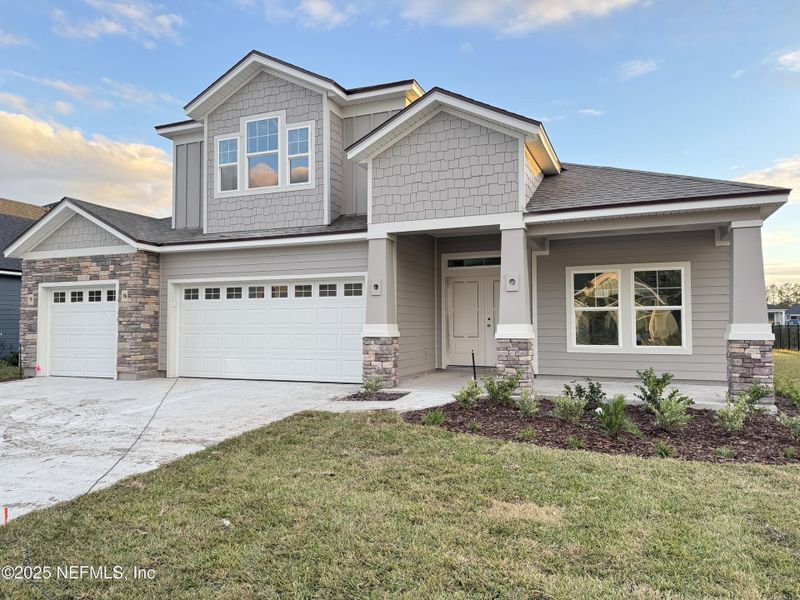Front exterior of a new home in , Green Cove Springs, FL, highlighting curb appeal (Image 8). Front exterior of a new home in , Green Cove Springs, FL, highlighting curb appeal (Image 8).