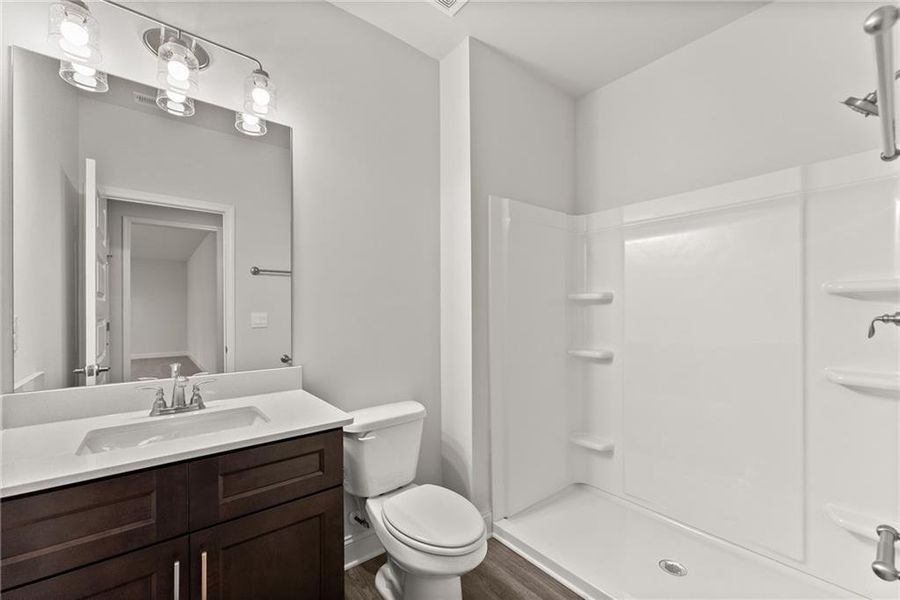 Furnished interior view inside a new home in Magnolia Villas, Cornelia (Image 8).