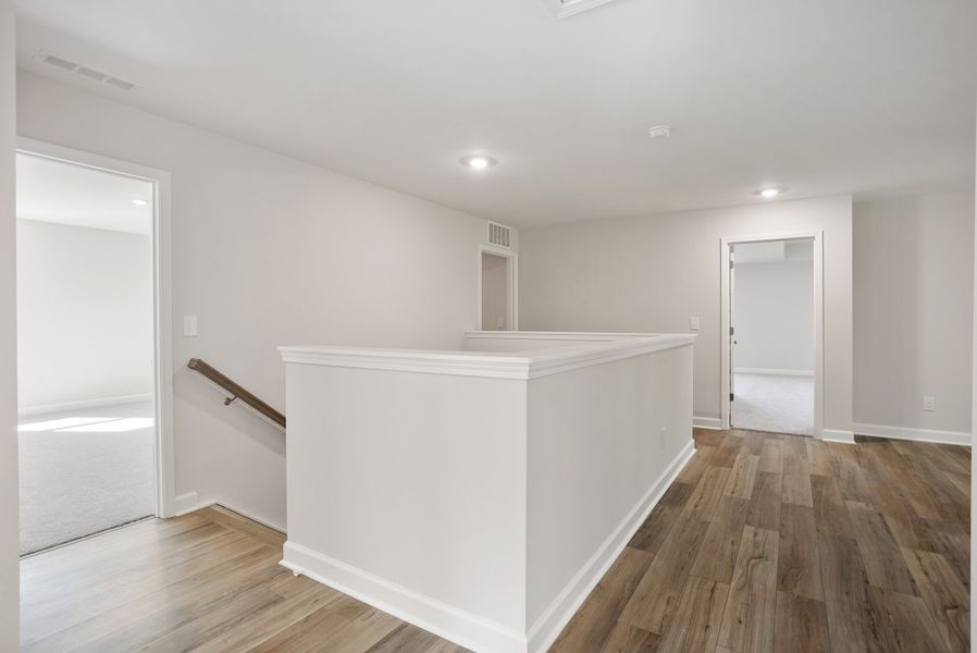 Spacious, unfurnished interior of a new home in Georgias Landing, Raleigh (Image 29).