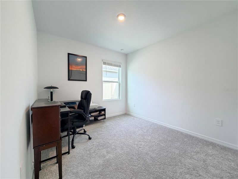 Furnished interior view inside a new home in Westview Community Group Page, Kissimmee (Image 18).