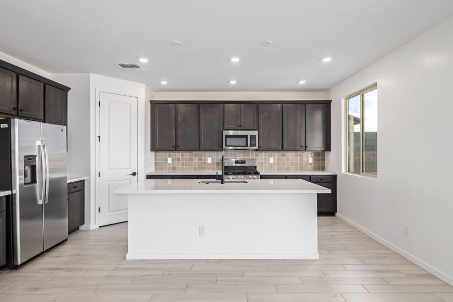 Furnished interior view inside a new home in Frontera, Surprise (Image 4).