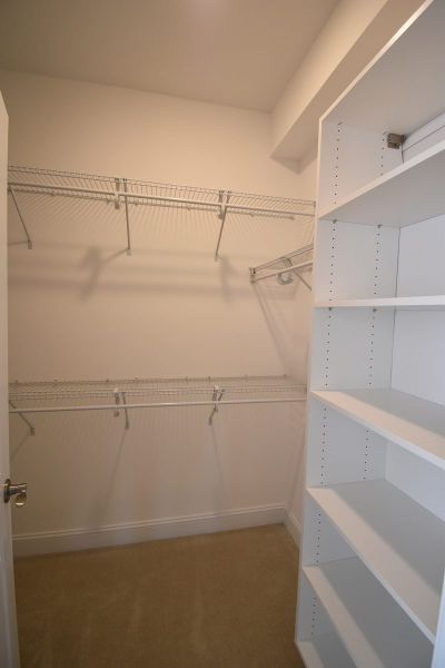 Representative unfurnished interior of a home built from the Cambridge by Keystone Homes NC in Weybridge, Burlington (Image 53).