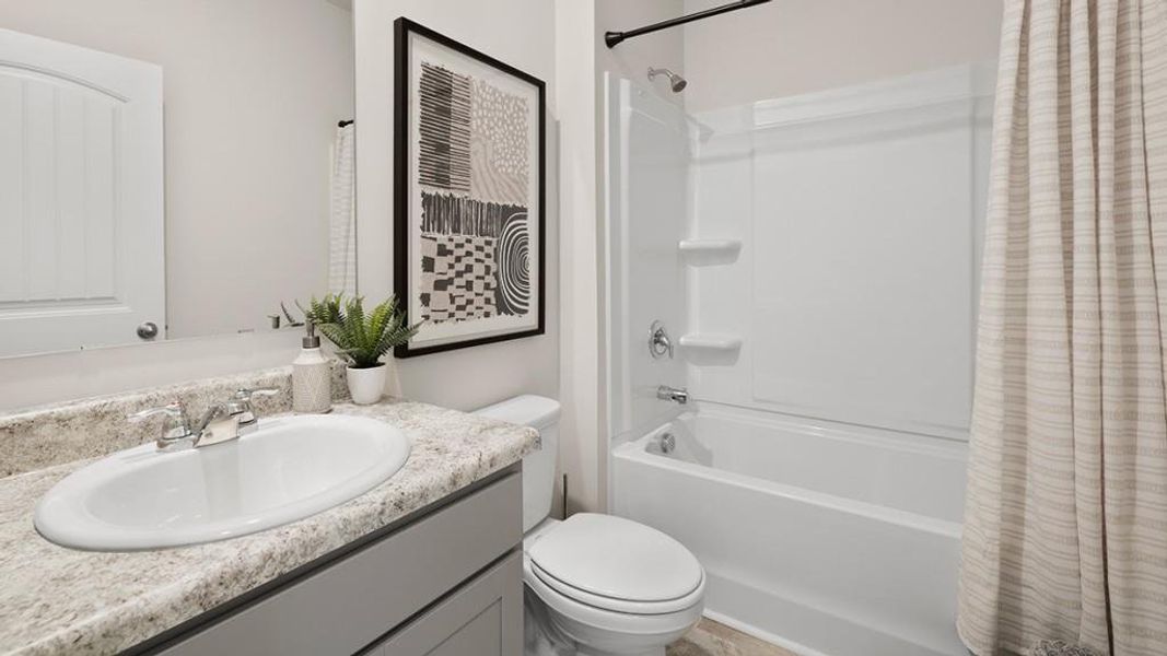 Furnished interior view inside a new home in Oaks at Cedar Grove, Fairburn (Image 13).