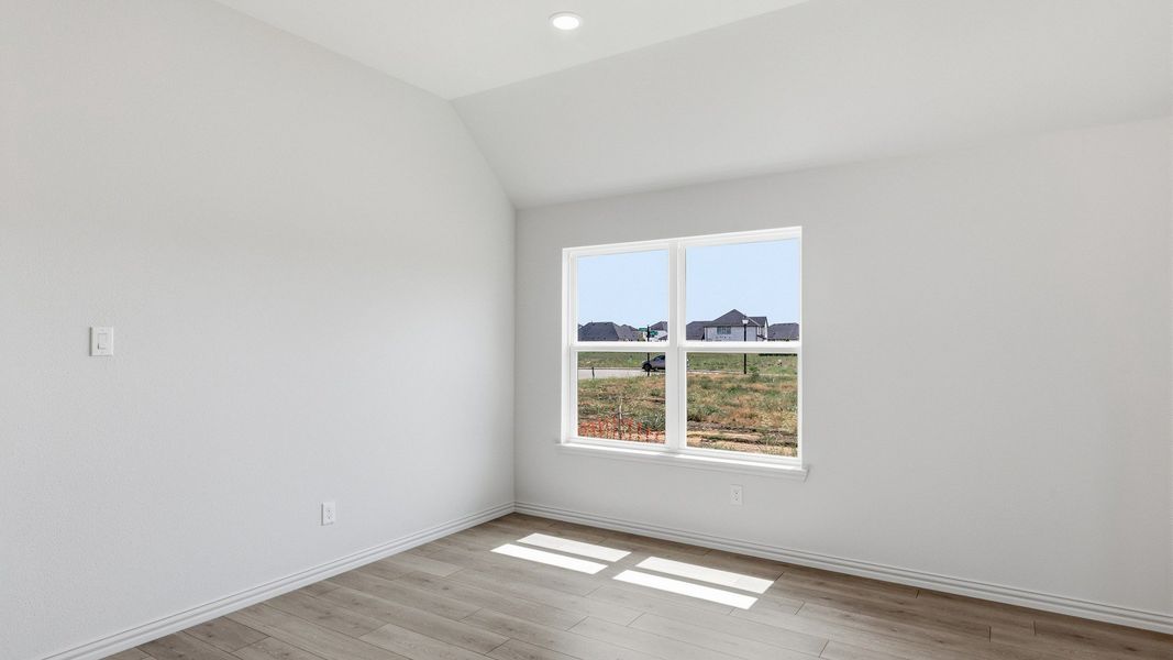 Furnished interior view inside a new home in Green Meadows Premier, Celina (Image 12).