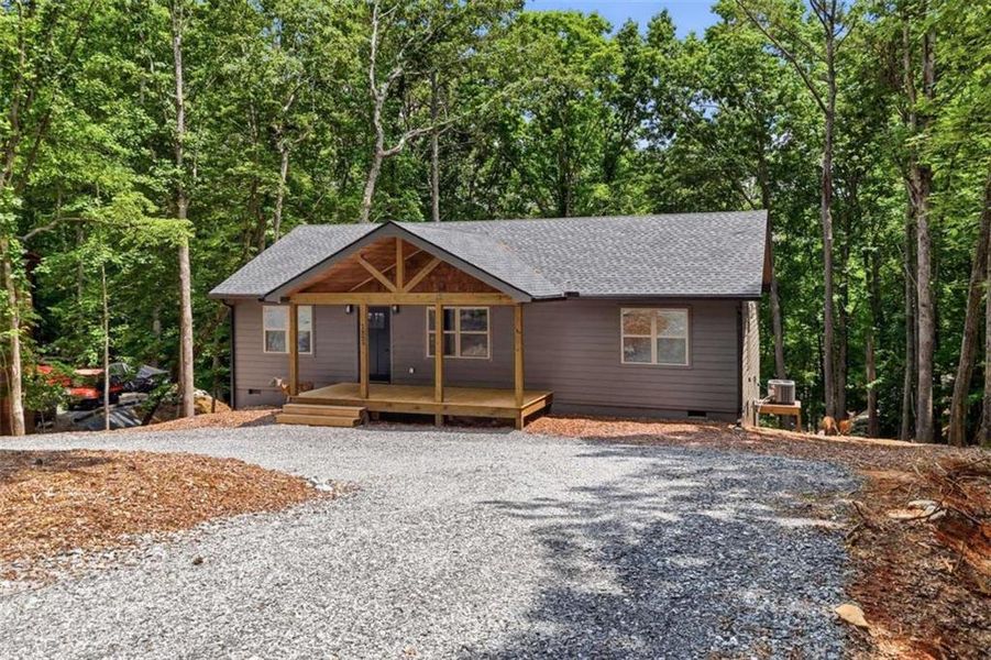 Exterior details and patio area of a home in , Ellijay (Image 30).